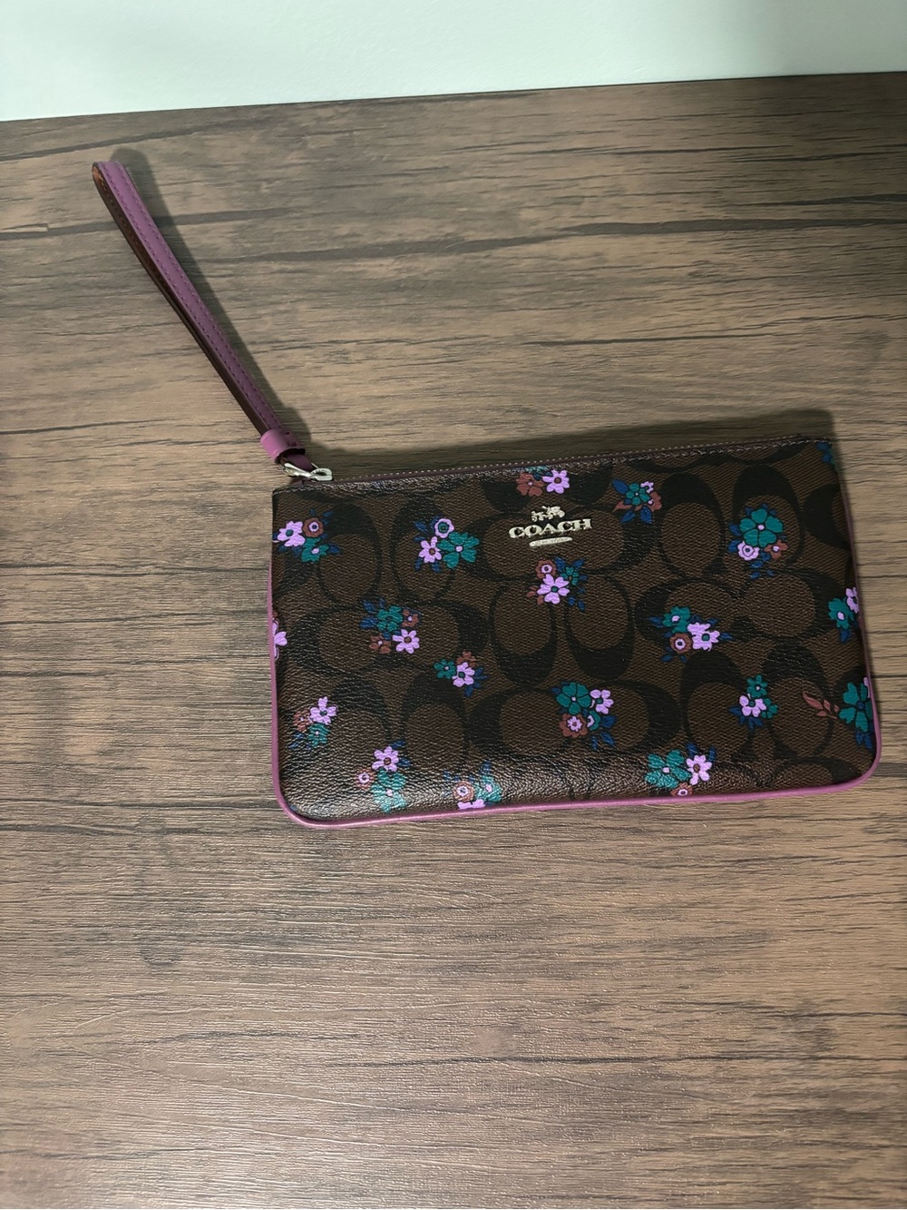 Coach Brown Signature Floral Wristlet with Purple Trim